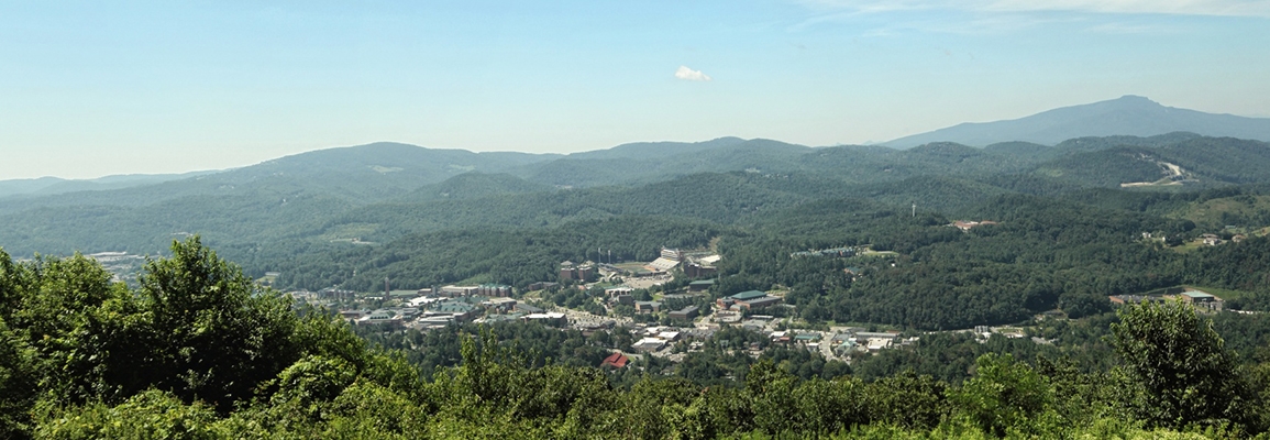 Aerial view of downtown Boone surrounded by the Blue Ridge Mountains