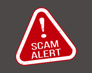 Red triangle sign with Scam Alert and exclamation point inside